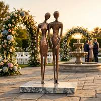 Sculpture abstraite moderne minimaliste grandeur nature en bronze, couple tenant la main, statue en bronze