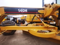 Niveleuse à moteur Caterpillar CAT 140H d'occasion, 138 kW, d'origine japonaise, largeur de lame 3660 mm, 15 tonnes, engin de construction