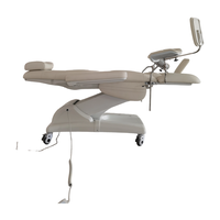 Lit de traitement électrique multifonctionnel de luxe pour soins gynécologiques et réparation du plancher pelvien avec roulettes