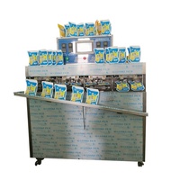 Machine de remplissage scellage de sachets d'alcool entièrement automatique machine de remplissage de sachets d'emballage en plastique d'alcool