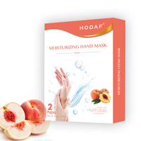 Vente en gros en usine de masque pour les mains nourrissant et hydratant à la pêche masque blanchissant pour les mains soins de la peau pendant la nuit