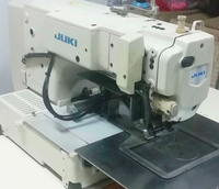 Machine à coudre industrielle informatisée Juki 210en d'occasion, zone de couture 150 x 100 mm