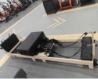 Máquina de Pilates Reformer Plegable de Madera de Arce de Alta Calidad a Precio de Fábrica, Equipo de Pilates Core Bed, Reformer de Pilates Plegable
