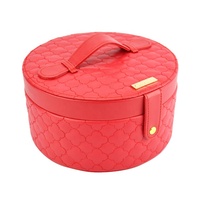 Étuis de toilette portables ronds en cuir avec doublure en satin rouge OEM/ODM pour femmes, avec rangement pour crème pour le visage et poudre libre