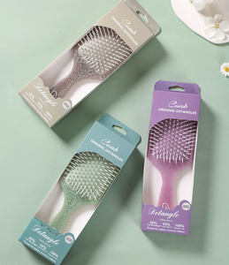 Brosse à cheveux démêlante ronde à manche en plastique, style creux, pour usage domestique, vente en gros à bas prix - Product Image 3