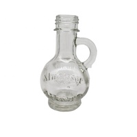 Tersedia 30Ml 1Oz Botol Kaca Logo Ukir Mini Botol Kaca Minyak Zaitun Kustom dengan Pegangan untuk Minyak