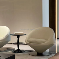 Fauteuil individuel de salon au design italien de luxe, pivotant à 360 degrés, au style affirmé, pour la détente, la discussion et l'accueil