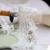 Dentelle française avec broderie sur le marché Accessoires de dentelle soluble dans l'eau en soie de polyester pour la maison et la mode pour chaussures et sacs