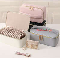Vente en gros d'emballage de mini bijoux léger à la mode coffret cadeau de collier en velours avec logo personnalisé petit anneau de voyage portable avec fermeture éclair