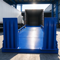 Rampe de conteneur en promotion : Niveleur de quai mobile réglable en acier haute résistance avec rampe hydraulique pour entrepôt/chariot élévateur