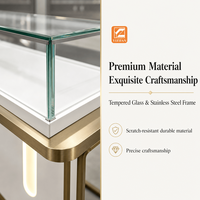 Vitrine de présentation de bijoux en verre blanc et acier inoxydable avec éclairage LED, comptoir de luxe robuste, mobilier de vente au détail sur mesure pour boutique