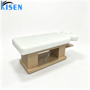 Le lit de massage électrique de style thaïlandais Kisen est doté d'un cuir de qualité supérieure et d'une base en bois réglable, adapté aux massages du visage et du corps. - Product Image 1