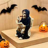 Vente directe usine : Figurine en résine amusante de squelette Grim Reaper assis sur les toilettes en lisant un journal – Statue de squelette