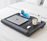 Table de lit multifonctionnelle pour ordinateur portable avec surface en bois et base rembourrée, idéale pour travailler et lire sur le canapé
