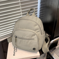 Sac à dos en nylon pour femme, style été 2025, petit, léger, multi-poches, polyvalent, décontracté, résistant à l'eau, en polyester, à porter sur la poitrine