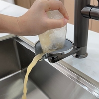 Robinet de cuisine moderne gris chaud/froid en acier inoxydable 304 avec pulvérisateur flexible en céramique argenté électroplaqué et rotation à 360°