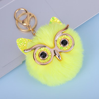 Porte-clés animal et décoration de sac Owen Porte-clés en peluche à pompons en fausse fourrure multicolore