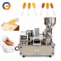 Machine automatique rotative de remplissage et de scellage de cuillères à miel pour l'emballage de produits alimentaires liquides
