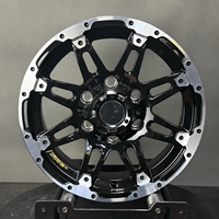 Jante de roue automobile multi-rayons noire et argentée avec bord extérieur usiné et détail de rivets décoratifs pour SUV et camionnettes