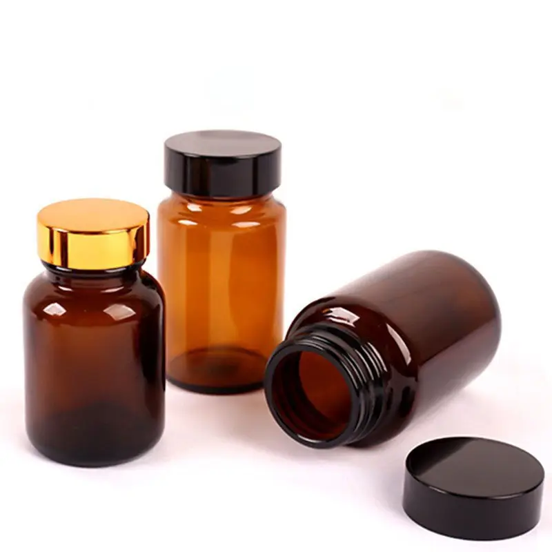 Custom logo 60ml 75ml 100ml 120ml 150ml health care amber glass pill glass bottle with UV protection and black lid bulk sale