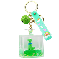 Porte-clés carré avec figurines de dinosaures à l'intérieur, avec cordon et clochette, couleur verte, personnalisation disponible, pendentif de sac