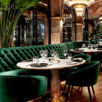 Canapé de luxe en tissu de velours vert demi-rond en bois pour stand de restaurant Table et chaise de café rond en marbre pour projet de restaurant