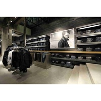 Équipement de boutique de mode, présentoir de vêtements sur mesure, table de présentation de vêtements, usine