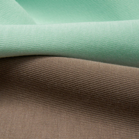 Nouveau stock – Tissu pour vêtements de sport en interlock tricoté peigné, 63 % coton biologique, 37 % polyester recyclé, 320 g/m², poids moyen