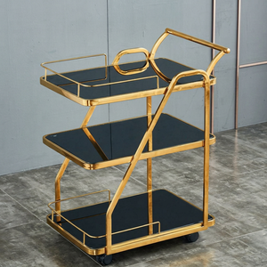Chariot de bar roulant en métal finition or, chariot à boissons de luxe, mobilier de bar pour la maison, chariot de bar contemporain avec étagère en verre noir pour boissons - Product Image 1