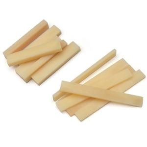 120 पीसी प्राकृतिक रंग खाली भैंस हड्डी गिटार नट्स और स्ट्रिंग उपकरणों के लिए काठी बास मंडोलिन बानजो उलुले भागों - Product Image 1