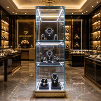 Vitrine en verre trempé avec éclairage LED personnalisé et base illuminée pour boutique de bijoux et centre commercial