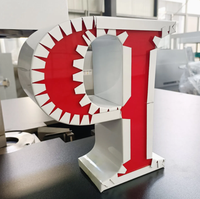 Machine de cintrage de lettres pour enseignes, avec bordure automatique, pour la fabrication de lettres en relief