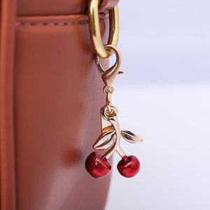 Sáng Tạo Vàng Gấu Đỏ Cherry Clover Bướm Túi Mặt Dây Chuyền Phụ Nữ Điện Thoại Keychain - Product Image 2