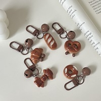 Porte-clés cloche à pain en plastique mignon, breloque ludique style alimentaire, accessoire inspiré d'Instagram pour sacs de filles et étudiantes