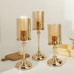 Set Lilin Mewah 3 Buah, Tempat Lilin Logam Emas Besar dengan Tutup Kaca Storm untuk Penggunaan di Meja Tengah Pernikahan - Product Image 1