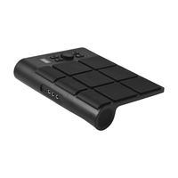 Batterie électronique de table avec 2 haut-parleurs, 9 pads, éclairage coloré, baguettes et pédale.