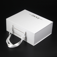 Luxeries personnalisé rigide brillant blanc aimant fermeture magnétique pliant cadeau de mariage boîte d'emballage Geschenk avec poignée de ruban