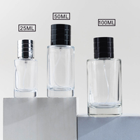Flacon de parfum en verre rond transparent rechargeable de haute qualité de 25 ml 30 ml 50 ml 100 ml avec couvercle noir/argent disponible