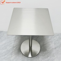 Table de salle à manger extérieure ronde compacte en acier inoxydable, style industriel moderne et épuré, 4 places, pour café et mobilier de salle à manger