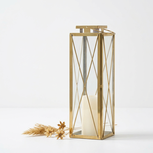 Fabricants de lanternes à bougies hautes et étroites en acier inoxydable doré pour la décoration de la maison et du patio - Product Image 1
