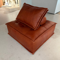 Ensemble de canapés de luxe en cuir véritable italien moderne pour salon, fabriqué à Foshan, avec table basse