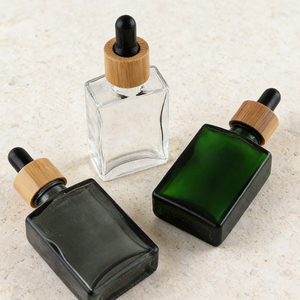 Nueva botella cosmética <span class=keywords><strong>de</strong></span> bambú esmerilado <span class=keywords><strong>de</strong></span> madera creativa ambiental botella cuentagotas <span class=keywords><strong>de</strong></span> vidrio rectangular para aceite esencial con 50ml - Product Image 4