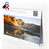 Calendrier mural classique en papier couché écologique avec reliure spirale, impression couleur intégrale pour décoration de galerie d'art, souvenir, vente en gros