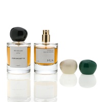 Vente en gros de flacons de parfum ronds en verre vides de 30 ml, 50 ml et 100 ml avec un nouveau design de bouchon