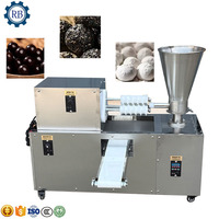 Machine automatique de fabrication de boules de riz avec machine de recouvrement et de roulage pour les boules énergétiques, les boules de sésame, les mochi