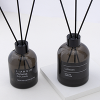 Bouteille vide de diffuseur de roseau de logo personnalisé 100ml 150ml 200ml bouteille en verre de diffuseur de roseau en gros