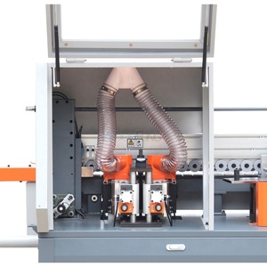 Machine à plaquer les chants avec pré-fraisage et rainurage pour machine à bois de traitement de meubles de type panneau de mélamine - Product Image 5