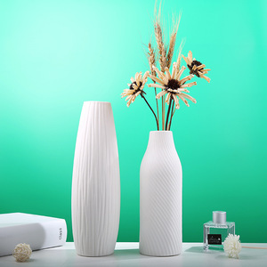 Nouveau vase en céramique blanc, style chinois moderne et épuré, pour la décoration de salon, d'entrée ou de table. - Product Image 1