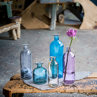 Vente en gros de vases à bourgeons de Offre Spéciale Vases à bourgeons décoratifs en verre coloré rustique pour mariage Petits mini centres de table à fleurs Vases en verre