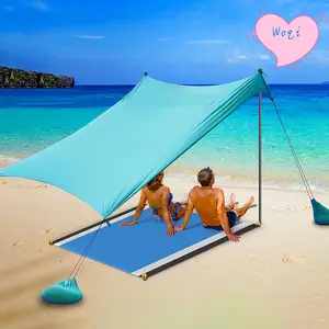 WOQI Pop Up Beach Tent Sun Shelter con alfombrilla de playa UPF50 + 2-4 personas Toldo al aire libre Sombrilla para acampar Pesca Patio trasero